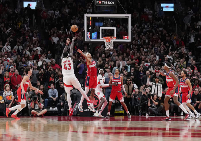 Toronto Raptors forward Pascal Siakam (43) shoots the ball at the basket as Washington Wizards forward Kyle Kuzma (33) goes for the block during the fourth quarter at Scotiabank Arena.